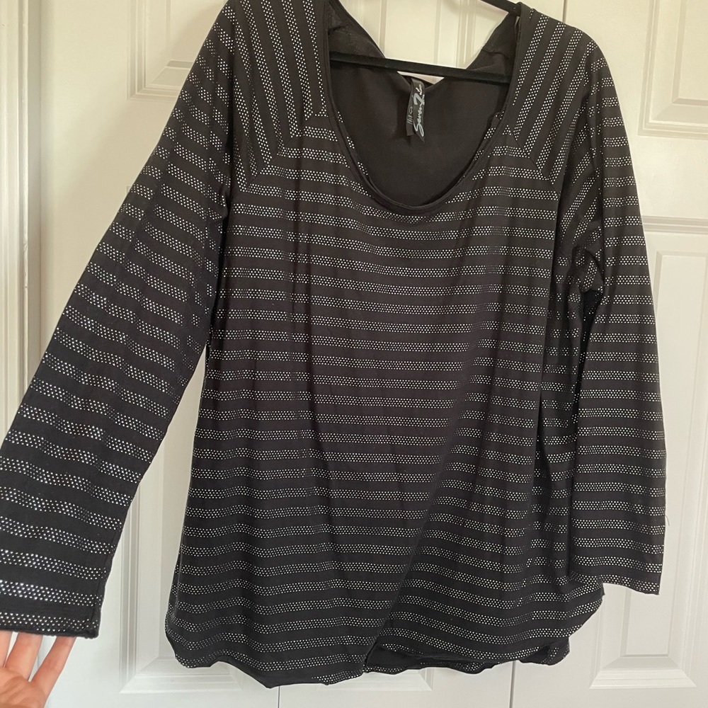 Woman’s black long sleeve tee